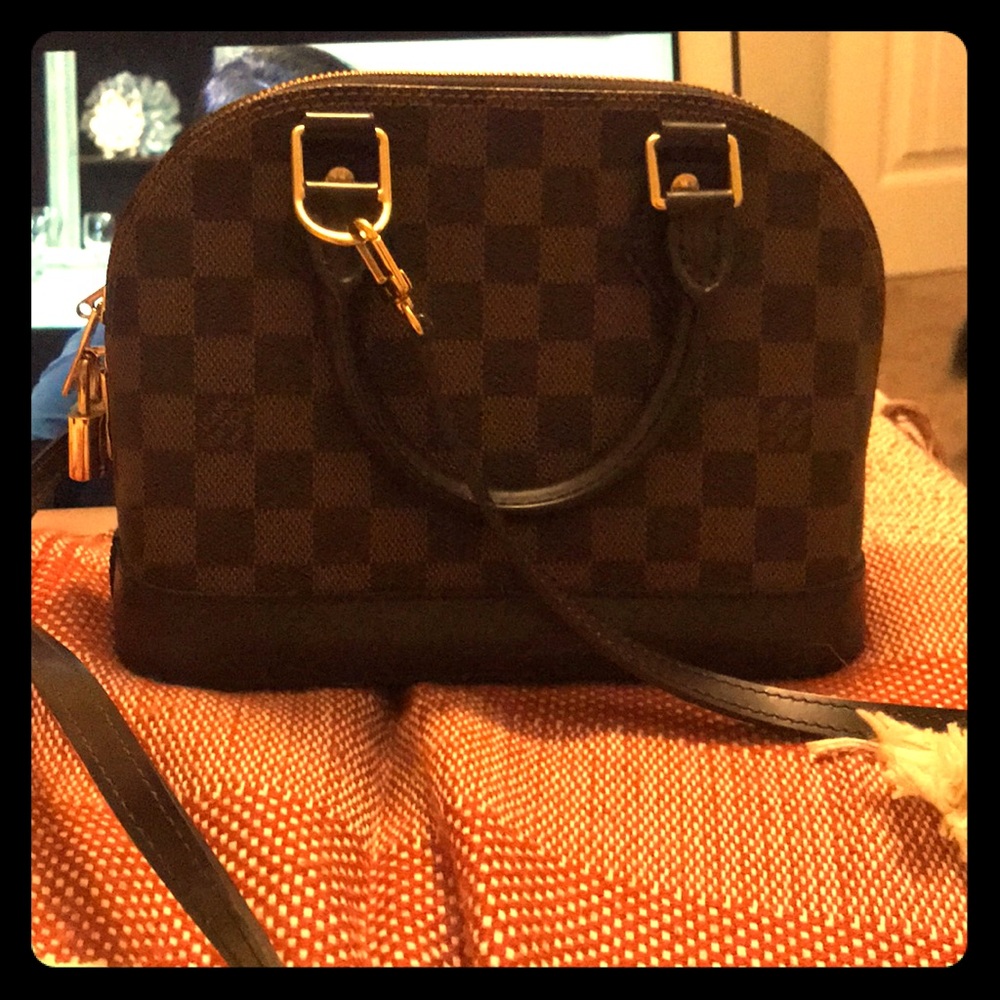 Louis Vuitton Alma BB top handle bag